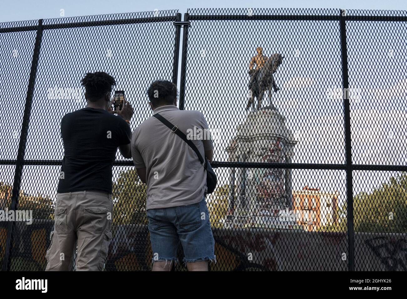 Richmond, United States. 07th Sep, 2021. Two men take last minute