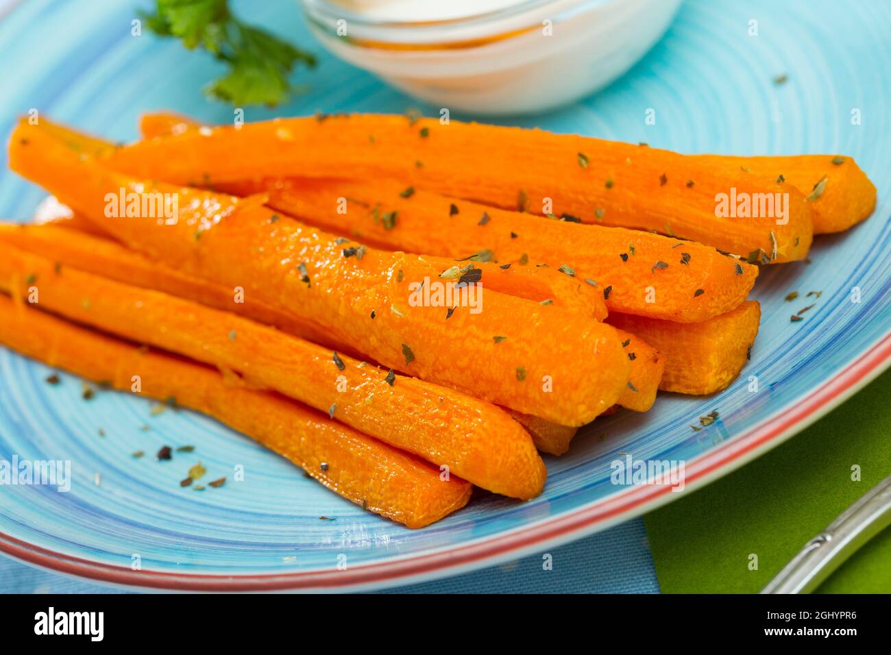 Image of carrot sticks deep fried and served with sour cream at plate Stock Photo Alamy