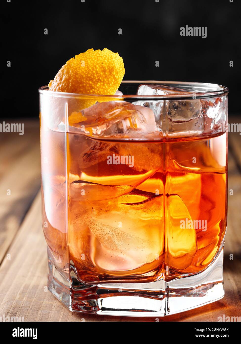 Negroni with Big Ice Cube and Saffron on Top in Vintage Glass Stock Image -  Image of vintage, whiskey: 217568501