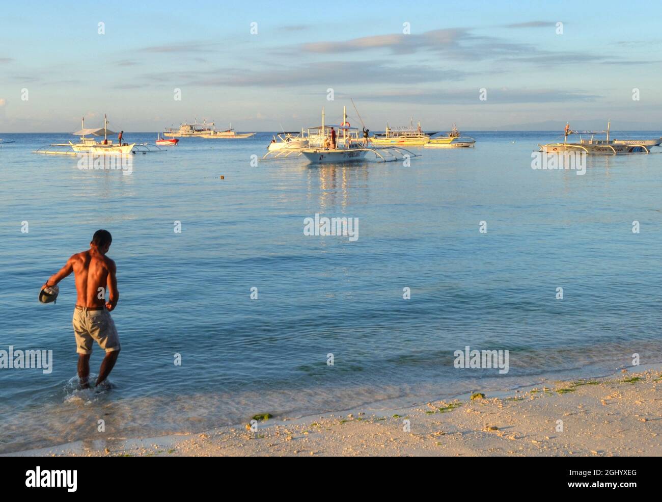 Filipino fishermen/tour guides with their bancas, Alona Beach, Panglao