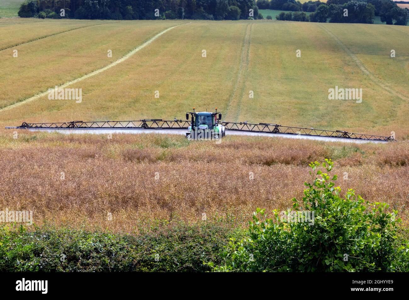 Agriculture - A farmer spraying pesticide on his crops - North Yorkshire - England. Stock Photo