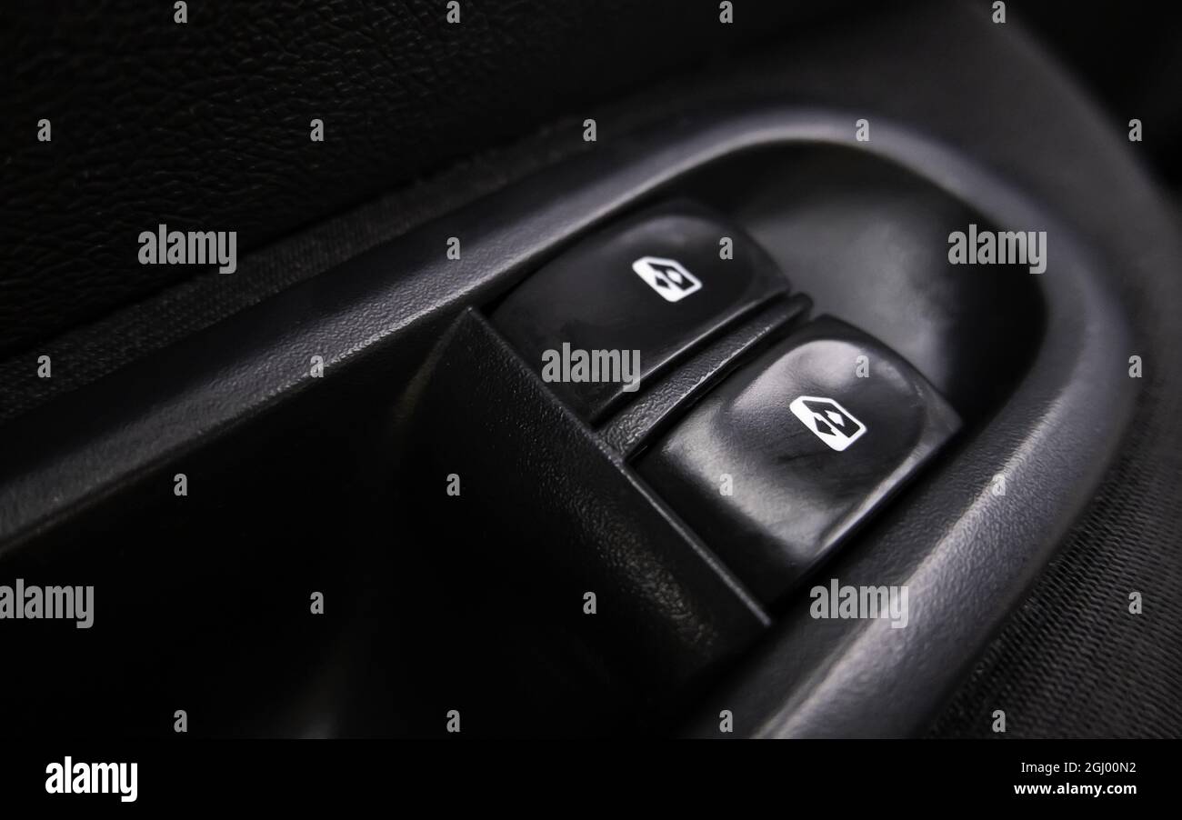Detail of buttons for raising and lowering car windows Stock Photo Alamy