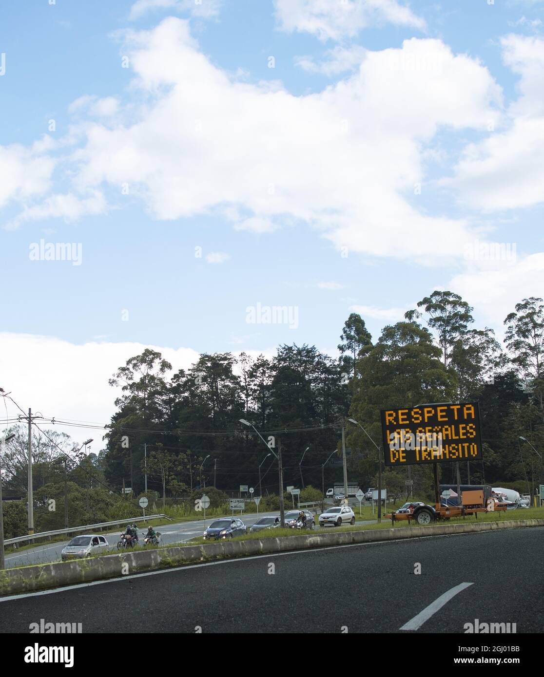 CALDAS, COLOMBIA - Aug 08, 2021: An English translation of 'Respect transit signals' along the road in Caldas, Colombia Stock Photo