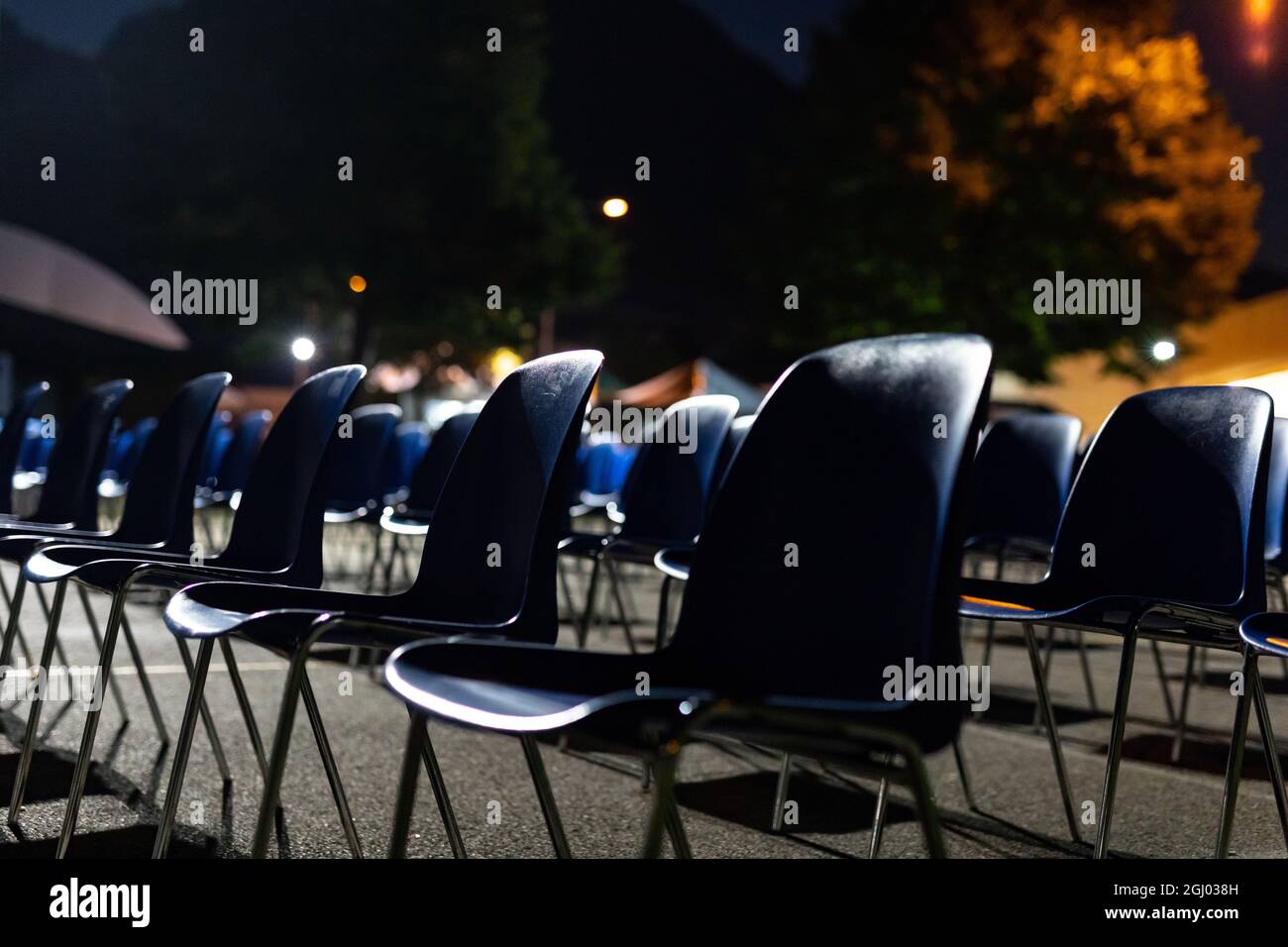 desolating rows of empty seats, in a place commonly used for outdoor performances now abandoned and waiting for the end of the pandemic, with the risk Stock Photo