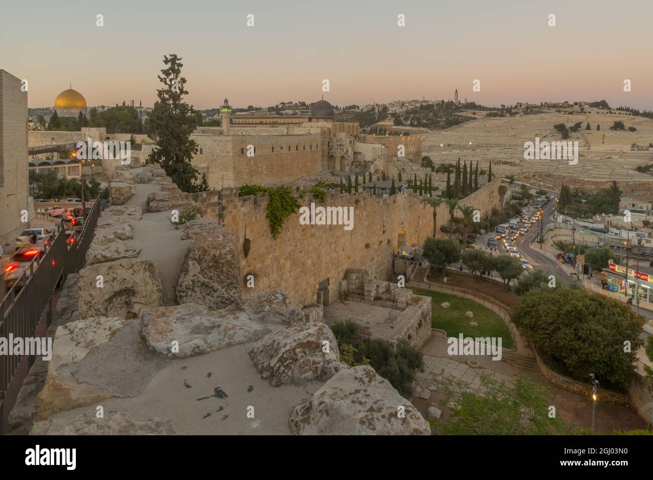 Jerusalem, Israel - August 29, 2021: Sunset view from the old city walls towards the temple mount and mount of olives, in Jerusalem, Israel Stock Photo