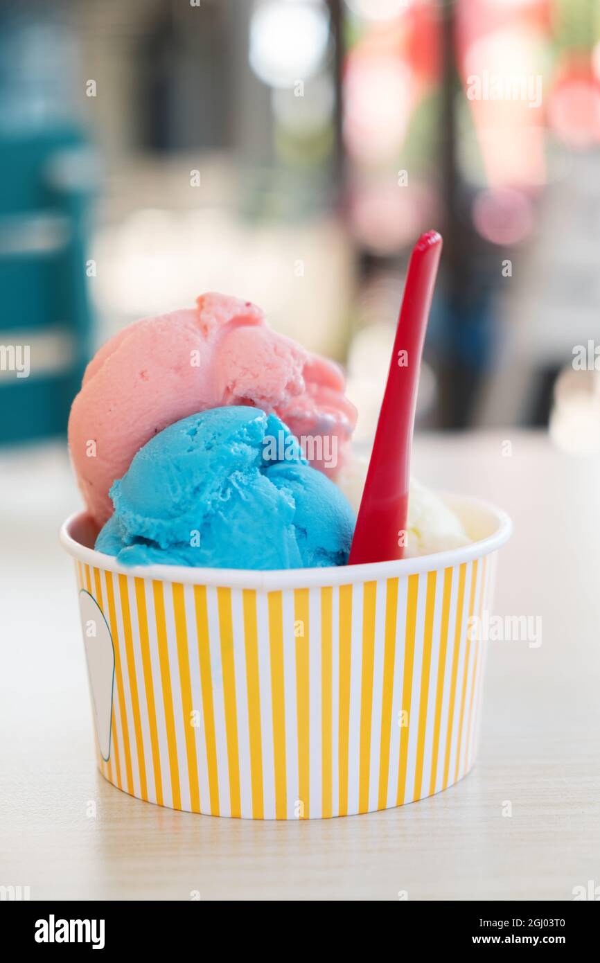 Ice cream balls in paper cup isolated on white background Stock Photo -  Alamy