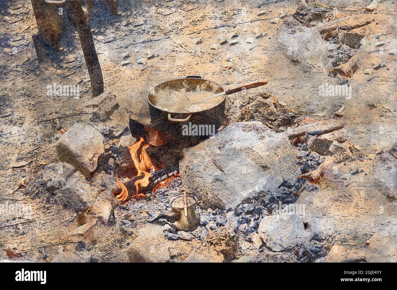A castiron kettle of fish soup on the fire. A cauldron is full Stock Photo Alamy