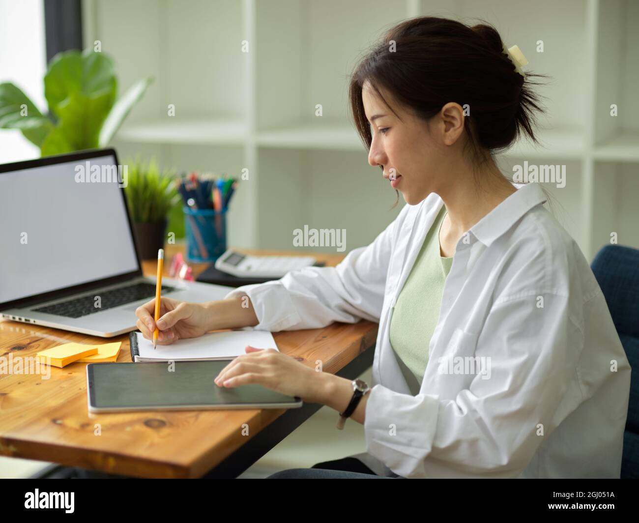 Pretty Engineers Pretty female architect engineers creating digital draft, sketching ...