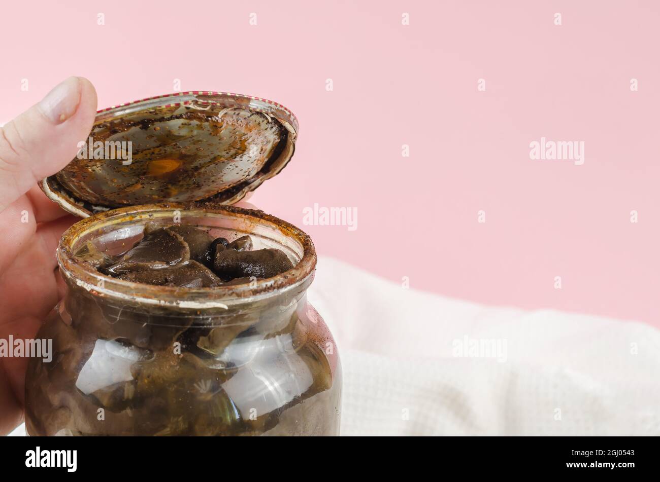 Botulism, food poisoning from canned foods concept. Handholds Ru Stock Photo