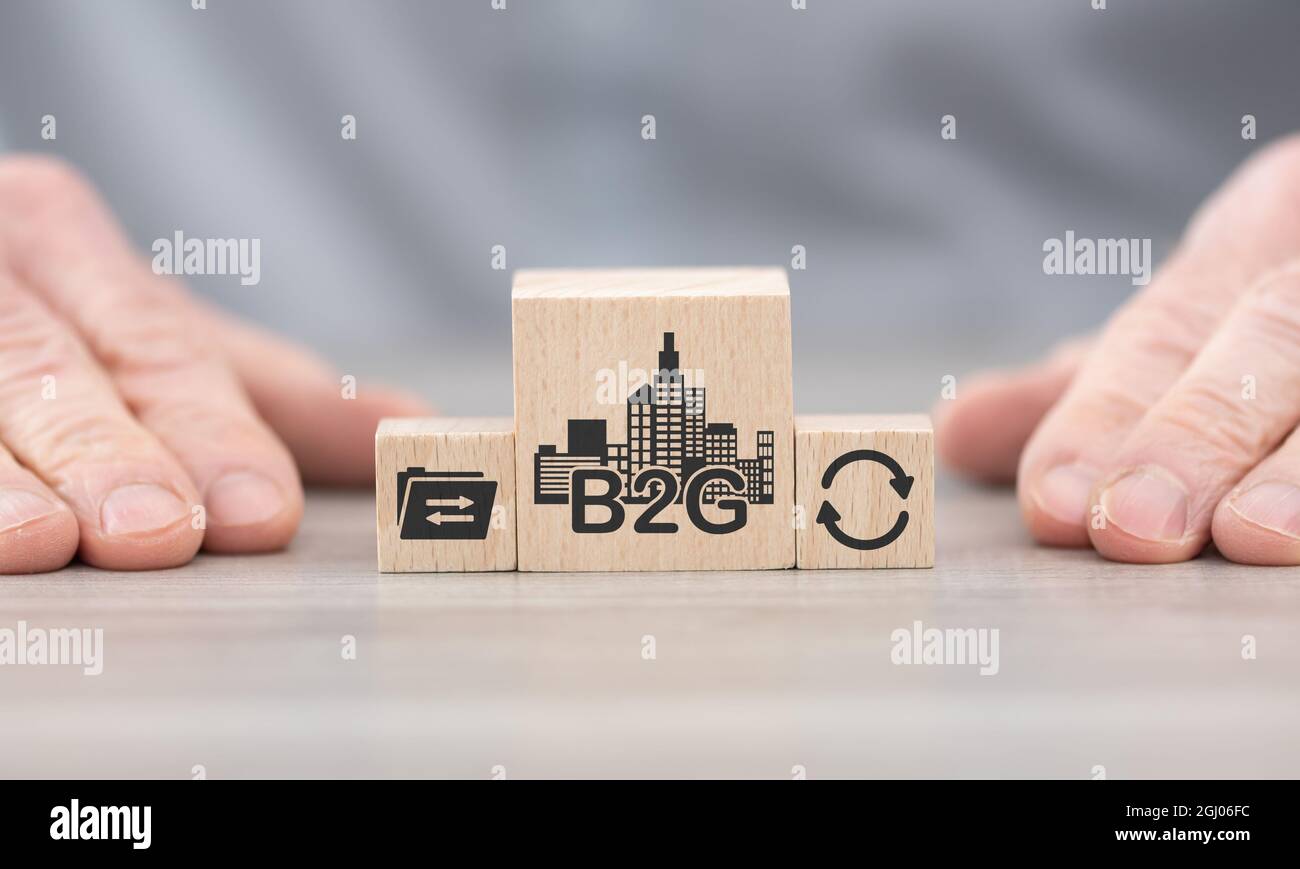 Wooden blocks with symbol of b2g concept Stock Photo - Alamy