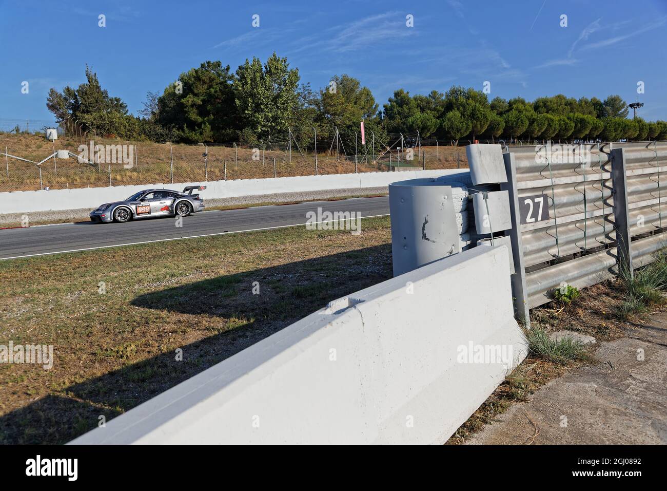 BARCELONA, SPAIN, September 5, 2021 : Porsche 911 and tracks walls during 24h Series, a long distance international racing championship for GT and Tou Stock Photo