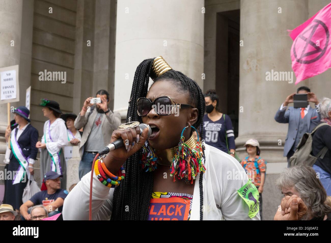 Marvina Newton - co-founder of Black Lives Matter - speaking at an XR protest outside the Bank of England, 27th August 2021. Stock Photo