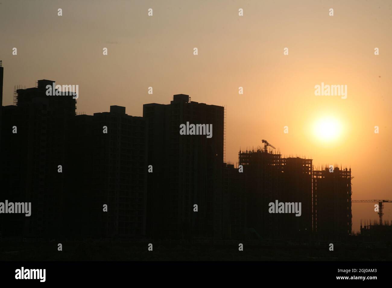 A view of a construction site of residential apartment in Greater Noida Delhi NCR, India. Stock Photo