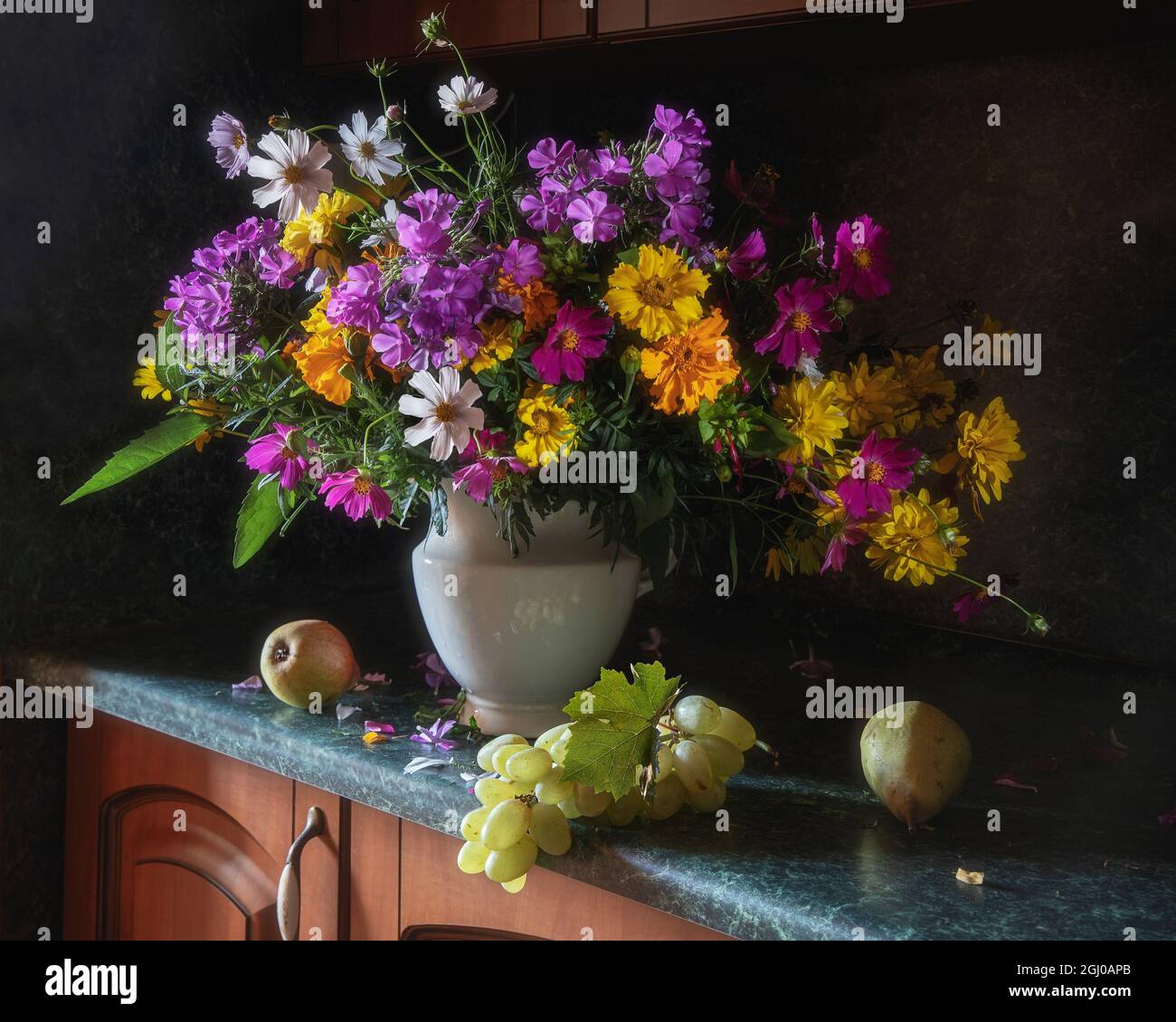 Still life with splendid bouquet and fruits in the interior Stock Photo ...
