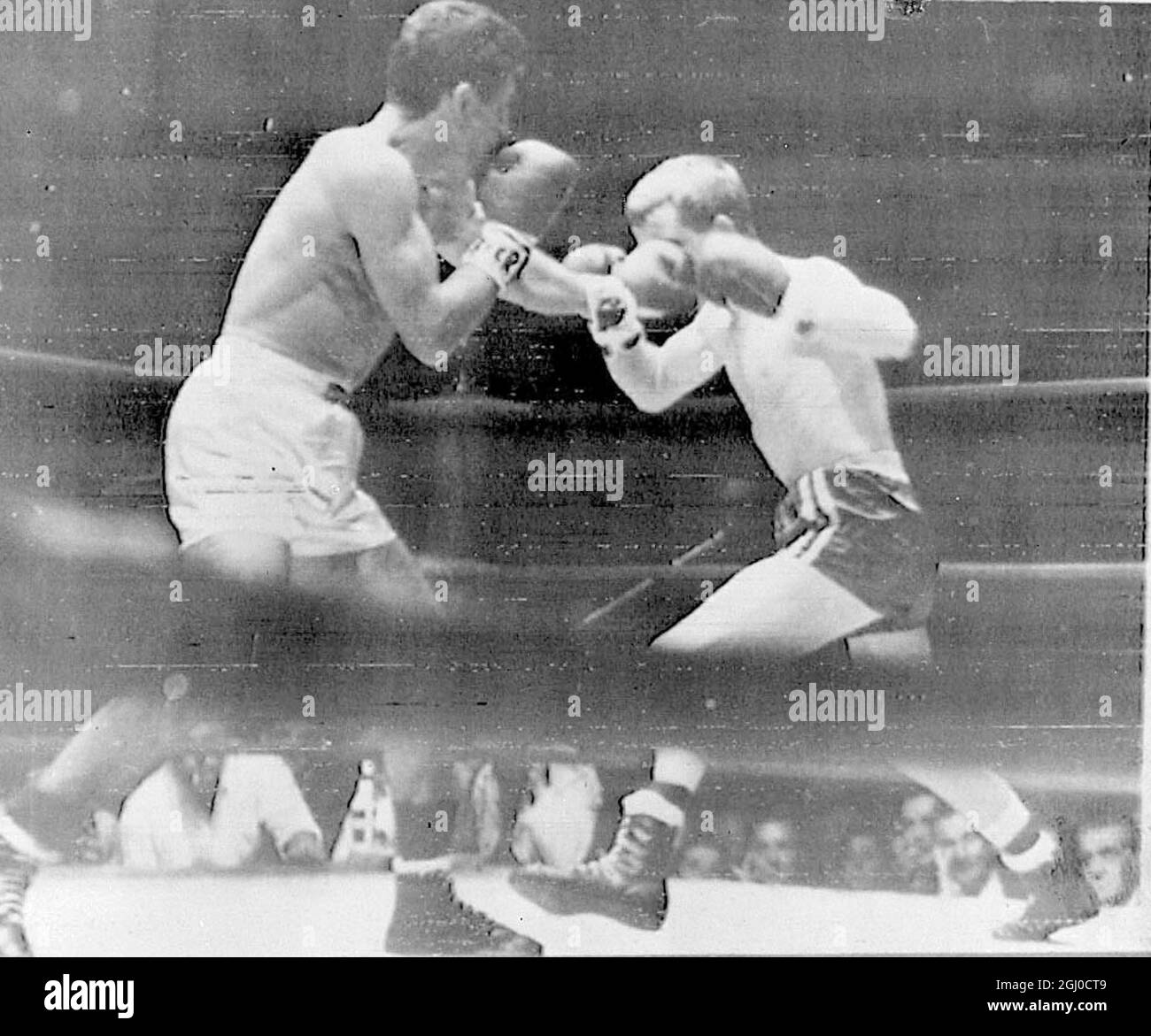 Brazilian Eder Jofre (left), connects with John Caldwell, during a Bantamweight title fight in Sao Paulo, Brazil 19th January 1962. Stock Photo
