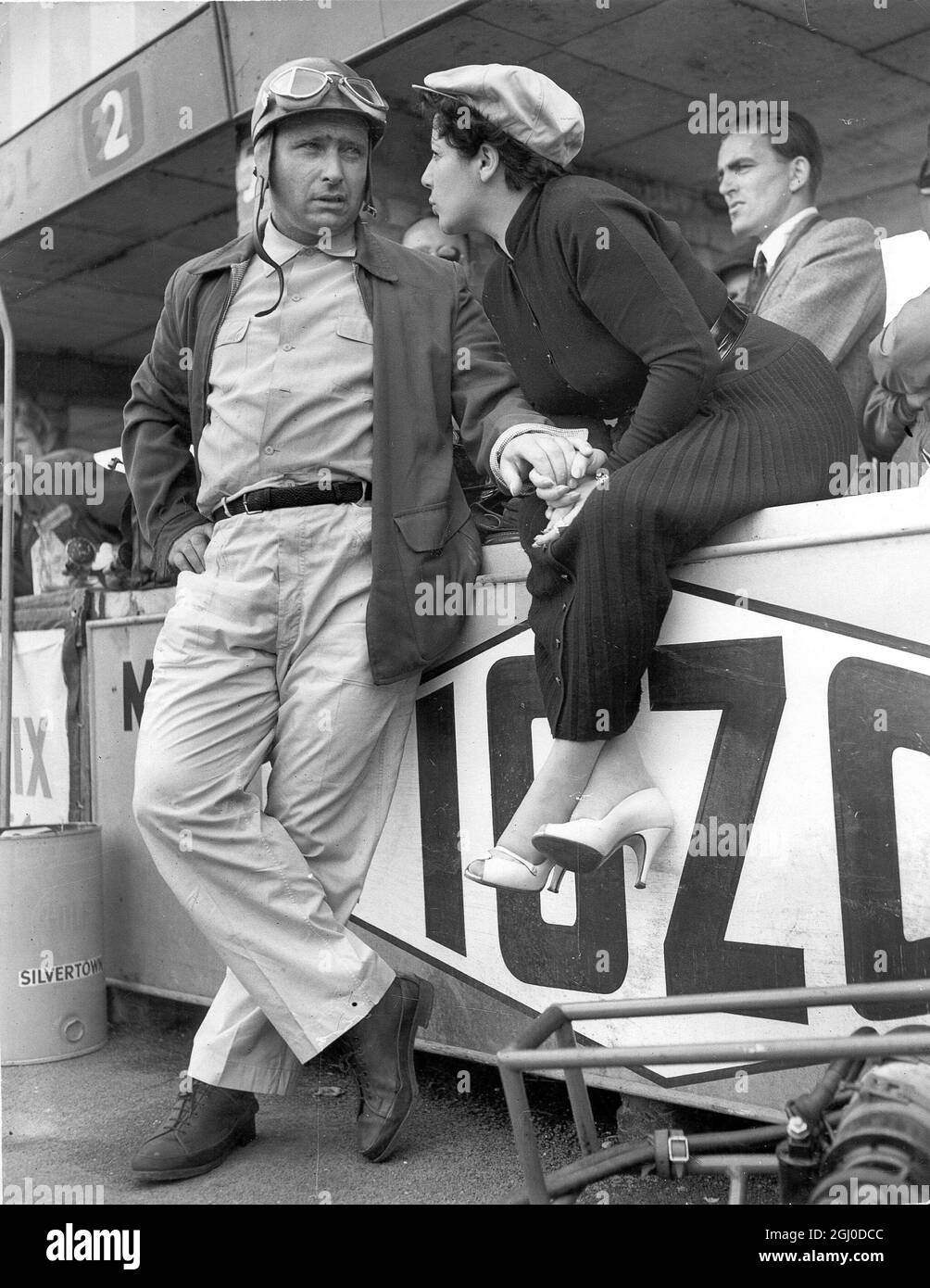 World champion racing driver Juan Manuel Fangio kidnapped from hotel in  Havana by armed cuban rebels February 24th 1958 Picture: Fangio and his  wife at Silverstone 1954 Stock Photo - Alamy