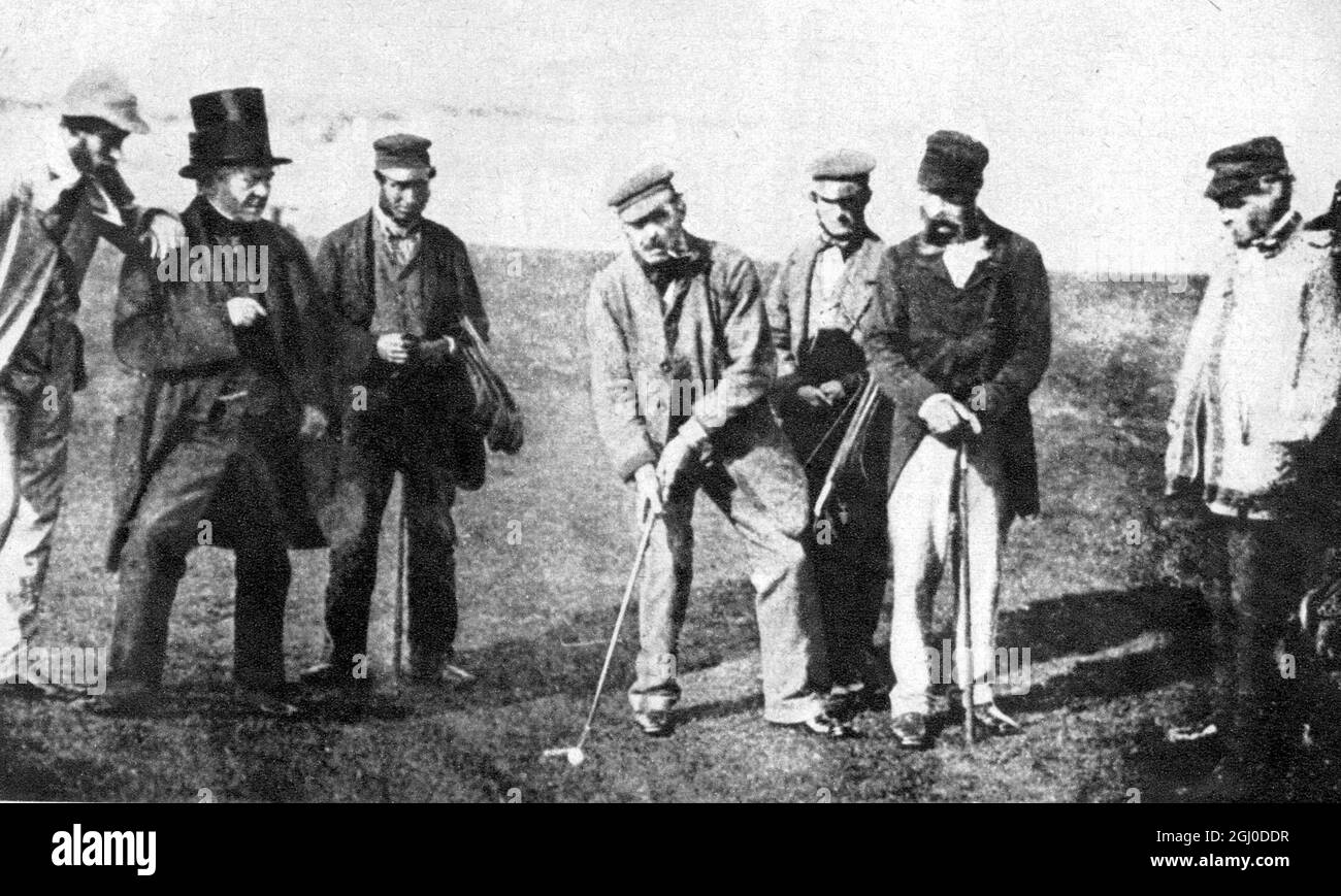 Victorian England 1865 men in hats playing golf Stock Photo