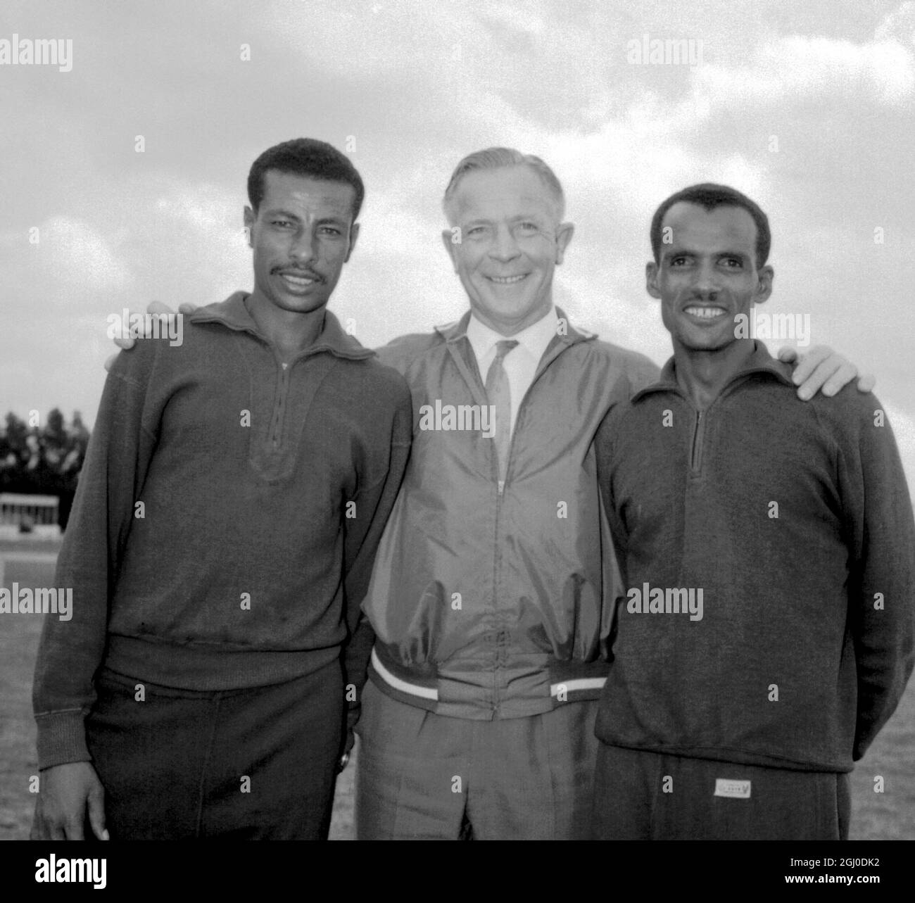 Swedish instructor, Major Onnis-Niskanen (centre) is pictured here in Addis Ababa with Ethopian's Abebe Bikila (left) and Mamo Wolde. Bikila is the record breaking marathon winner of the Rome Olympic Games of 1960 5th December 1963. Stock Photo