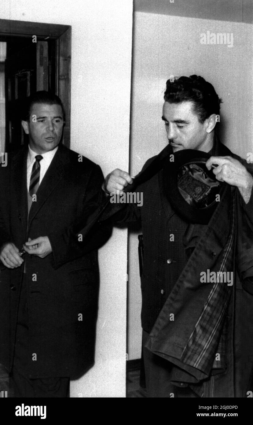 Hungarian European middleweight boxing champion Laszlo Papp (right) meets with former countryman Ferenc Puskas (left), star soccer player of Real Madrid. Papp is here to defend his title against spanish middleweight champion Luis Folledo in Madrid, Spain on December 6th. 3rd December 1963. Stock Photo