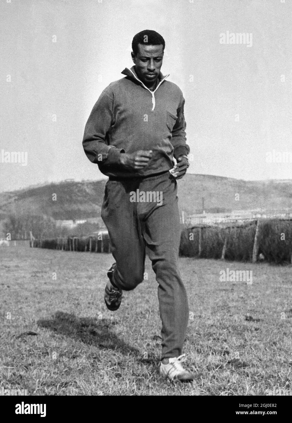 Abebe Bikila pictured training in San Sabastian, Spain 17th January 1964 Stock Photo