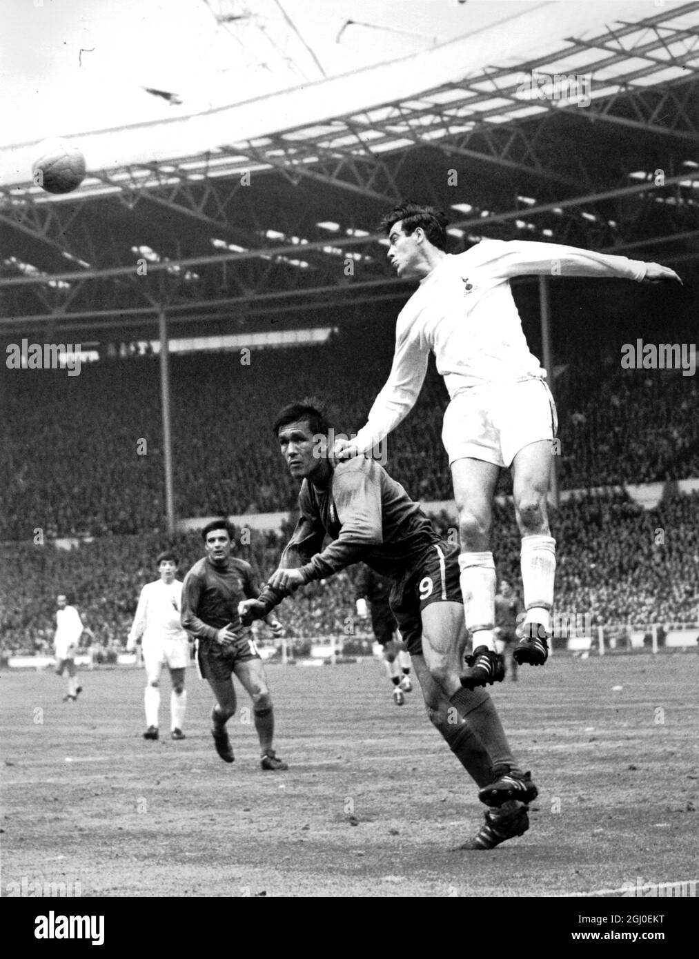1967 FA Cup Final Chelsea v Tottenham Hotspur Mike England (Tottenham) outjumps Tony Hateley, the Chelsea centre forward to head the ball clear during the FA Cup Final. 20th May 1967. Stock Photo
