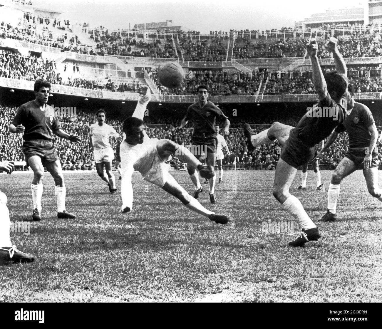 Real Madrid v Valencia Luis Del Sol, Real Madrid's inside right, hooks the ball past Valencia Real Madrid v Valencia Luis Del Sol, Real Madrid's inside right, hooks the ball past Valencia