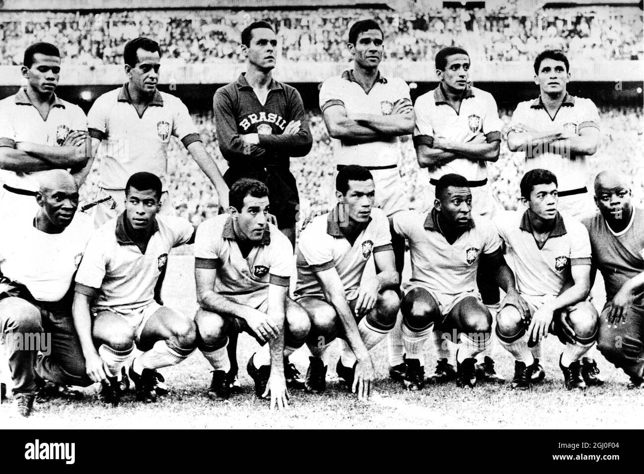The Brazilian Football team pose before their game in Madrid against Atletico Madrid: Back Row: Fidelis, Paulo Enrique, Gilmar, Brito, Zito and Altair. Front Row: after trainer (left) is Jair, Gerson, Servilio, Pele and Amarildo 24th June 1966. Stock Photo