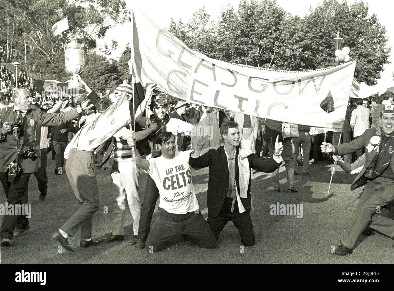 1967 European Cup Final Celtic v Inter Milan Jubilant fans of Scotland's  Celtic football team carry a mock up of the European Cup round the ground  after Celtic had defeated Inter Milan, image size:1300x961
