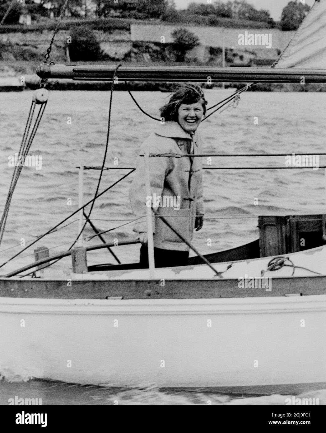 Woman to sail the Atlantic alone... 11th May 1952. The fantastically daring plan of 38 year old Ann Davison to be the first woman to sail the Atlantic single-handed in 'the sort of boat you could pull over your head and wear' - is the adventure story of the year. Today as she prepared to head for the high seas, messages of good will, encouragement and many warning her of the peril ahead pored in from all over the country. Many of the letters and telegrams were from other women who wish to share Ann's voyage. In slacks, jersey and duffle coat she went on a last minute shopping tour in Plymouth. Stock Photo