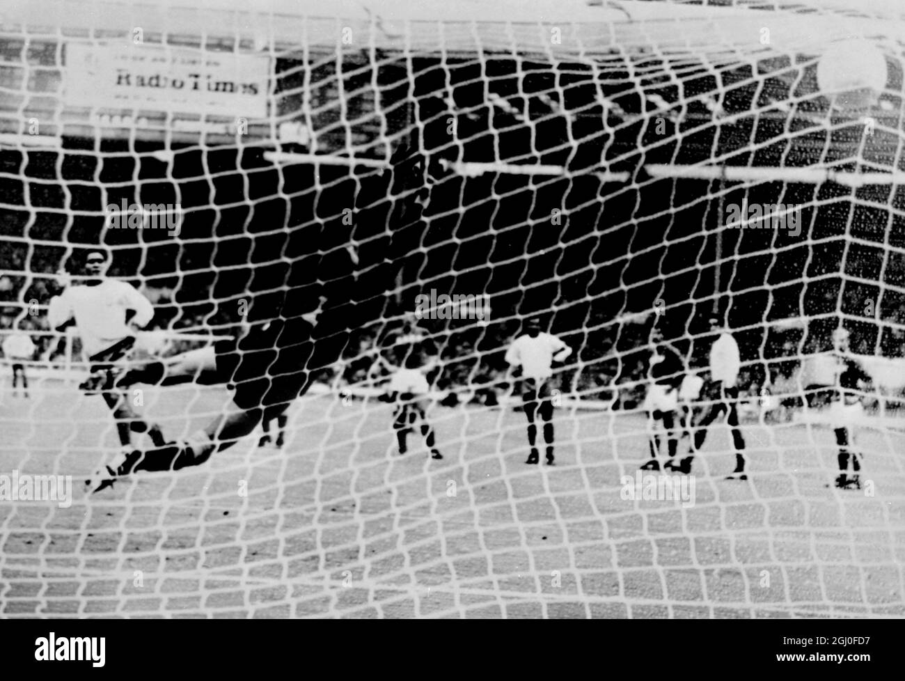 Portugal v Russia Russian goalkeeper Lev Yashin fails to save a penalty from Portugal's Silva Perrera Eusebio (left) during the World Cup 3rd and 4th place playoff at Wembley. 28th July 1966. Stock Photo