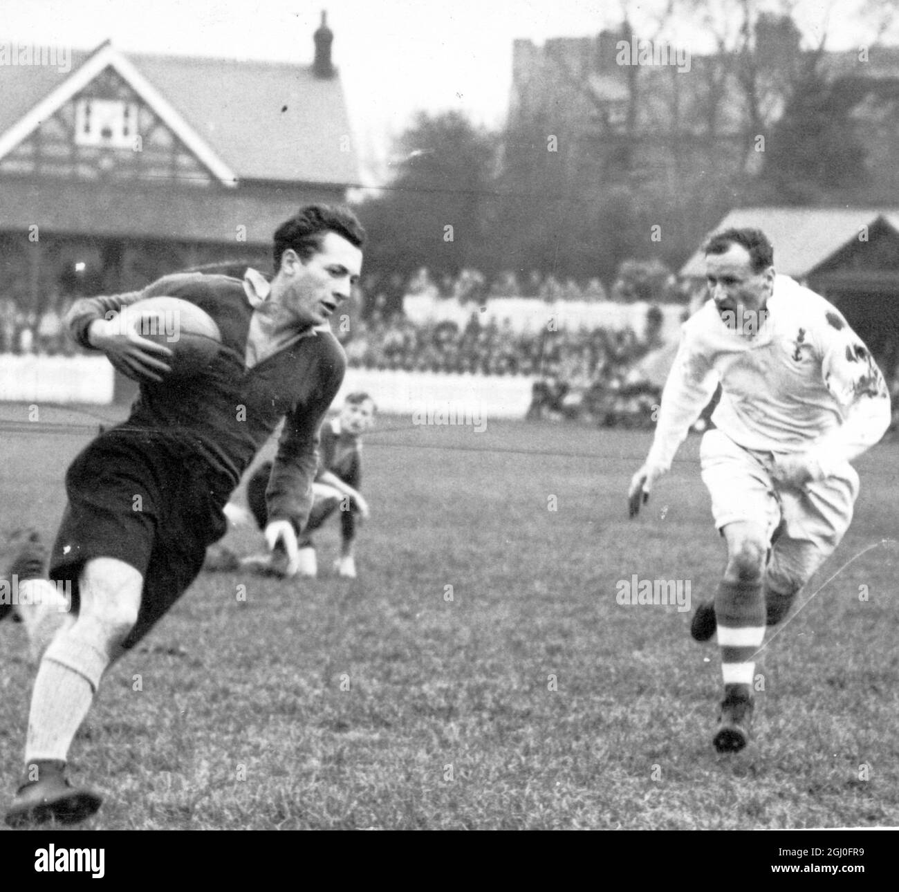 D W Swarbrick of Oxford University Team makes a dash for the line followed by C B Holmes during International Rugby Team 29 November 1946 Stock Photo