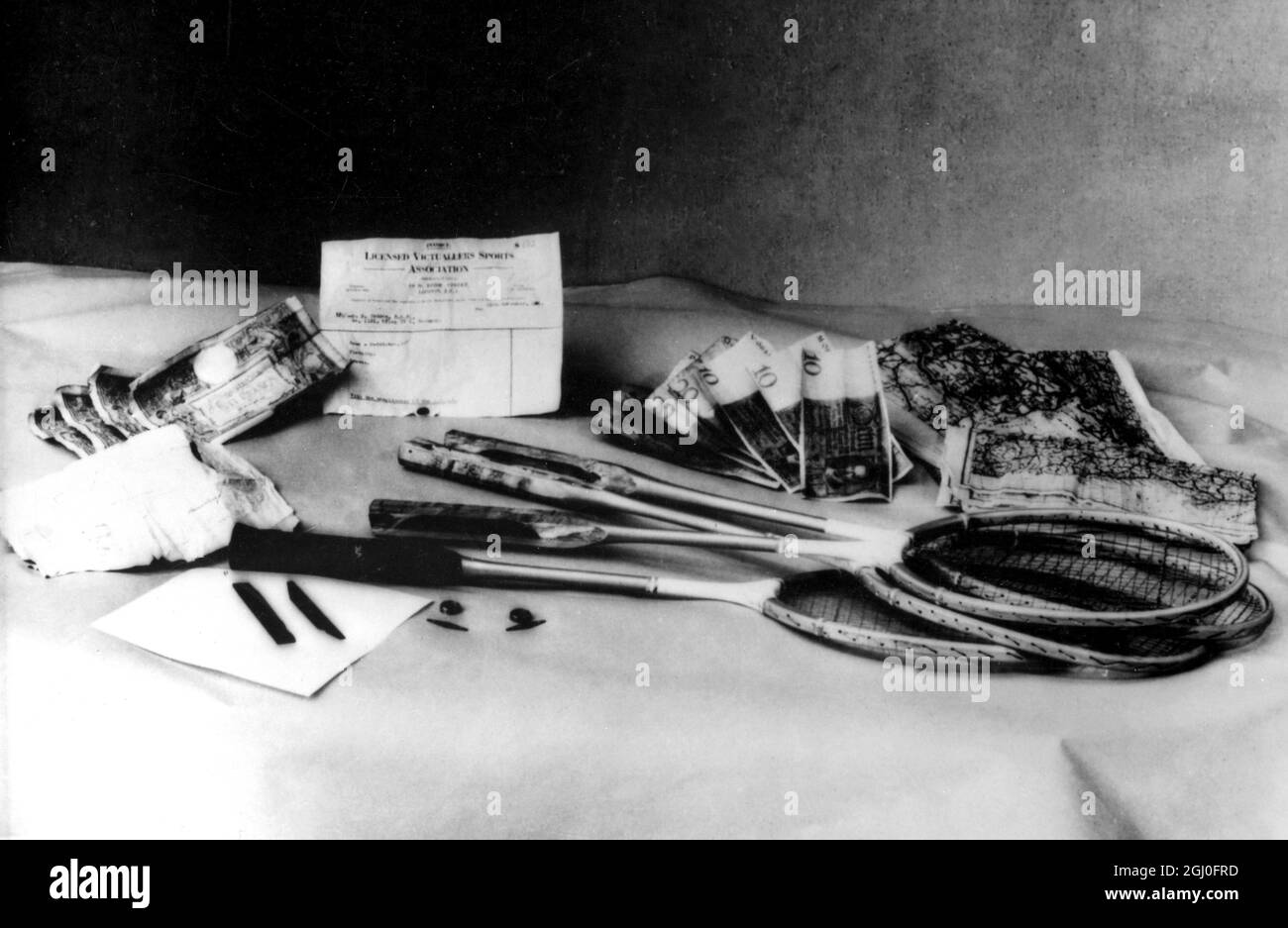 Maps and money hidden in handles of badminton racquets for POWs to aid allied escapes from Colditz Stock Photo