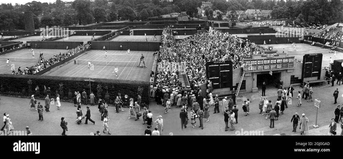 A general view of play in progress on the outside courts at Wimbledon today, when the first of the Ladies matches were played. 23rd June 1953 Stock Photo