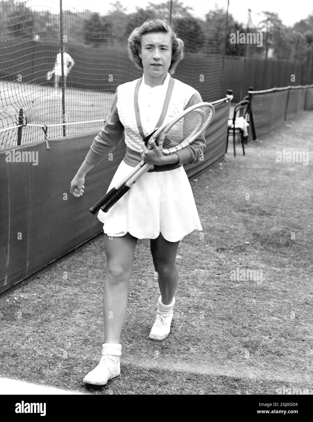 Maureen Connolly, America's 18 year-old tennis marvel, who is in England preparing for her defence of the Women's Singles title at Wimbledon. Little Mo is seen here at Beckenham in Kent. 11th June 1953 Stock Photo