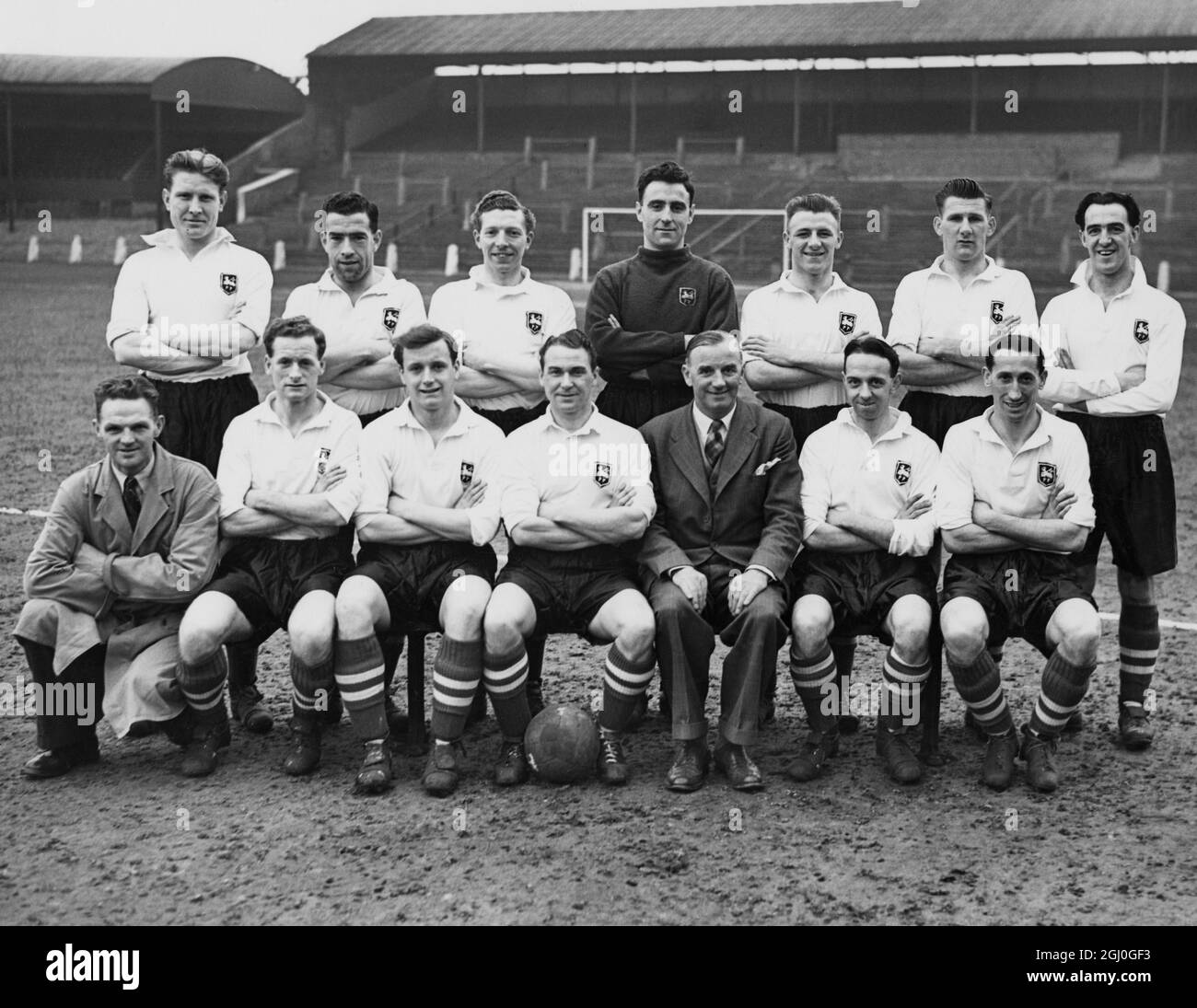 The Preston North End team to meet West Bromwich Albion in the Cup Final at Wembley on May 1st. Photo shows: (left to right front row) J. Milne (trainer), Finney, Foster, Wayman, Scot Symon (manager), Baxter and Morrison. (left to right, standing) Mattinson, Cunningham, Walton, Thompson, Docherty, Marston and Forbes. 24th April 1954 Stock Photo