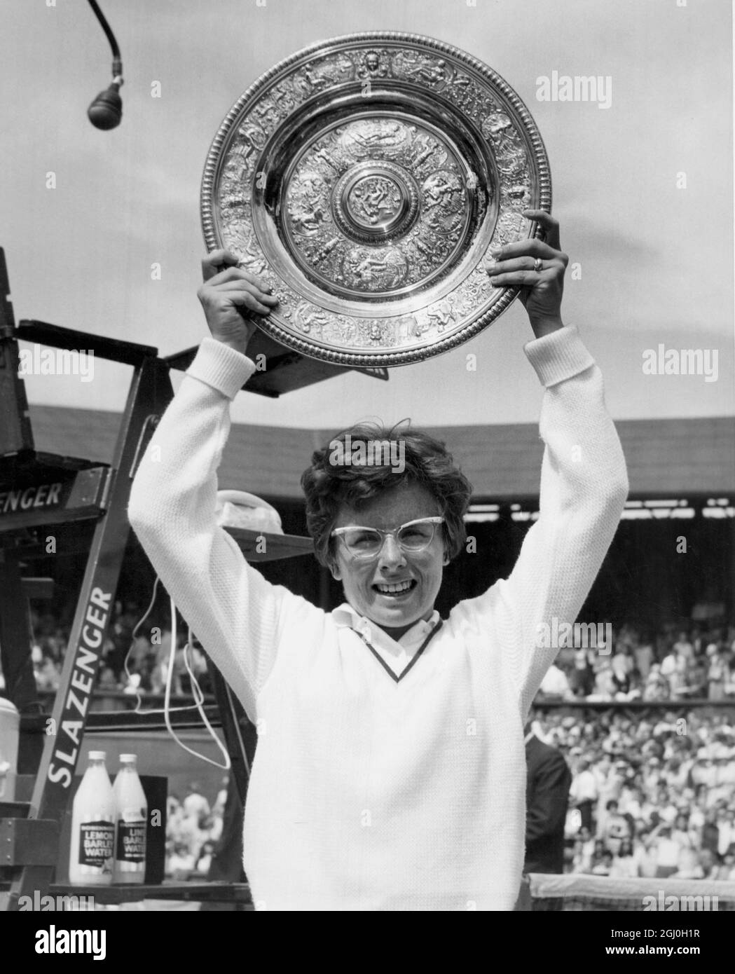 The winner, Mrs Billie Jean King, holds the Ladies Singles Cup aloft, after beating Maria Bueno, 6-3 3-6 6-1. 2 July 1966 Stock Photo
