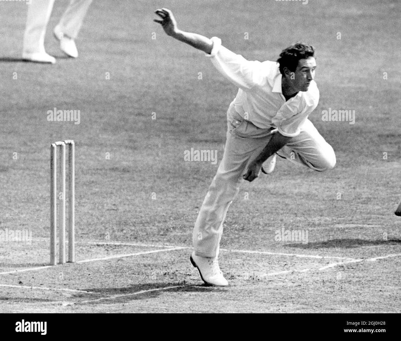 Jeff Jones, left arm fast medium bowler of Glamorganshire currently battling out the County Championship - in action for his county in the vital game against Sussex, being played at Hove, to-day (Thursday). Jones is likely to be among the players to tour Australia his winter with the M.C.C. 12 August 1965 Stock Photo