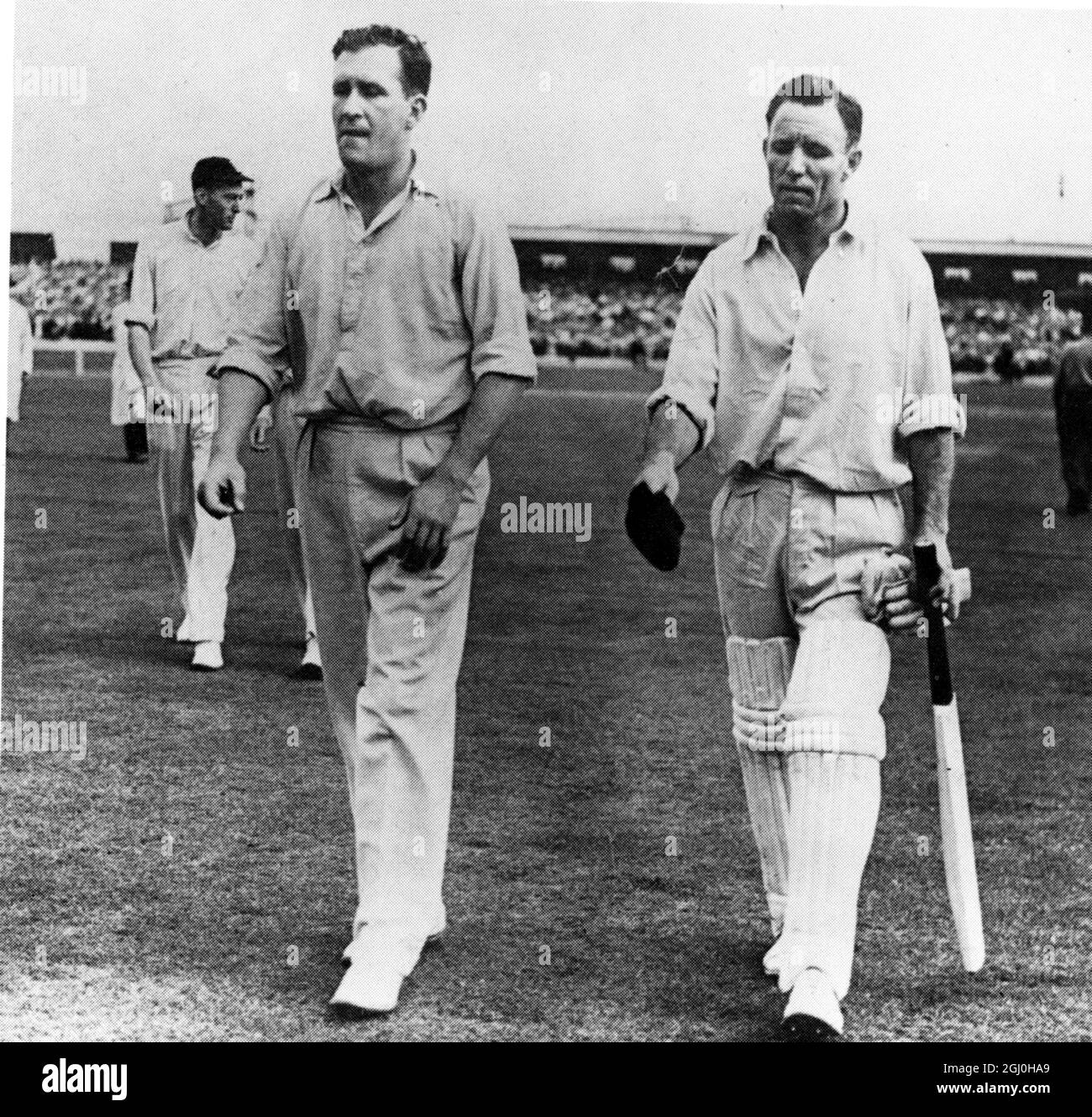 Jim Laker at Old Trafford in 1956 having taken nine wickets in the first Australian innings of the Test Match Stock Photo
