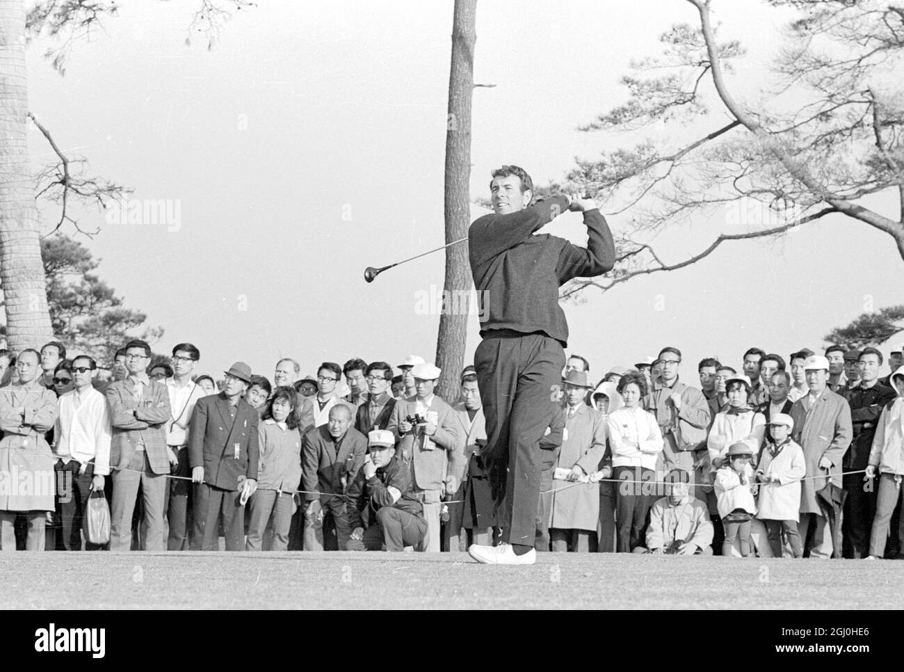Tokyo : Hugh Boyle. the Irish Professional, tees off at the start of the final in the International Open Golf Tournament at the Yomiuri Country Club here, April 10th Boyle won the tournament when his 286 put him two shots ahead of Australia's E. Ball. 13 April 1966 Stock Photo