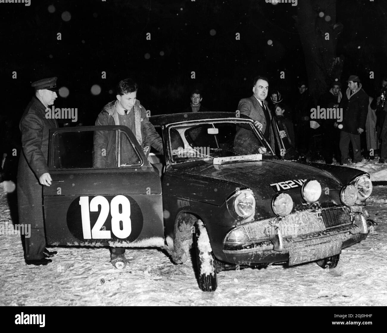 Arrivals at the passage control point at East Grinstead Sussex (The Old Felbridge Hotel) of competitors in the Monte Carlo Rally. Peter Fitzgerald the first arrival at East Grinstead, steps from his Ford on arrival. 19th January 1963 Stock Photo