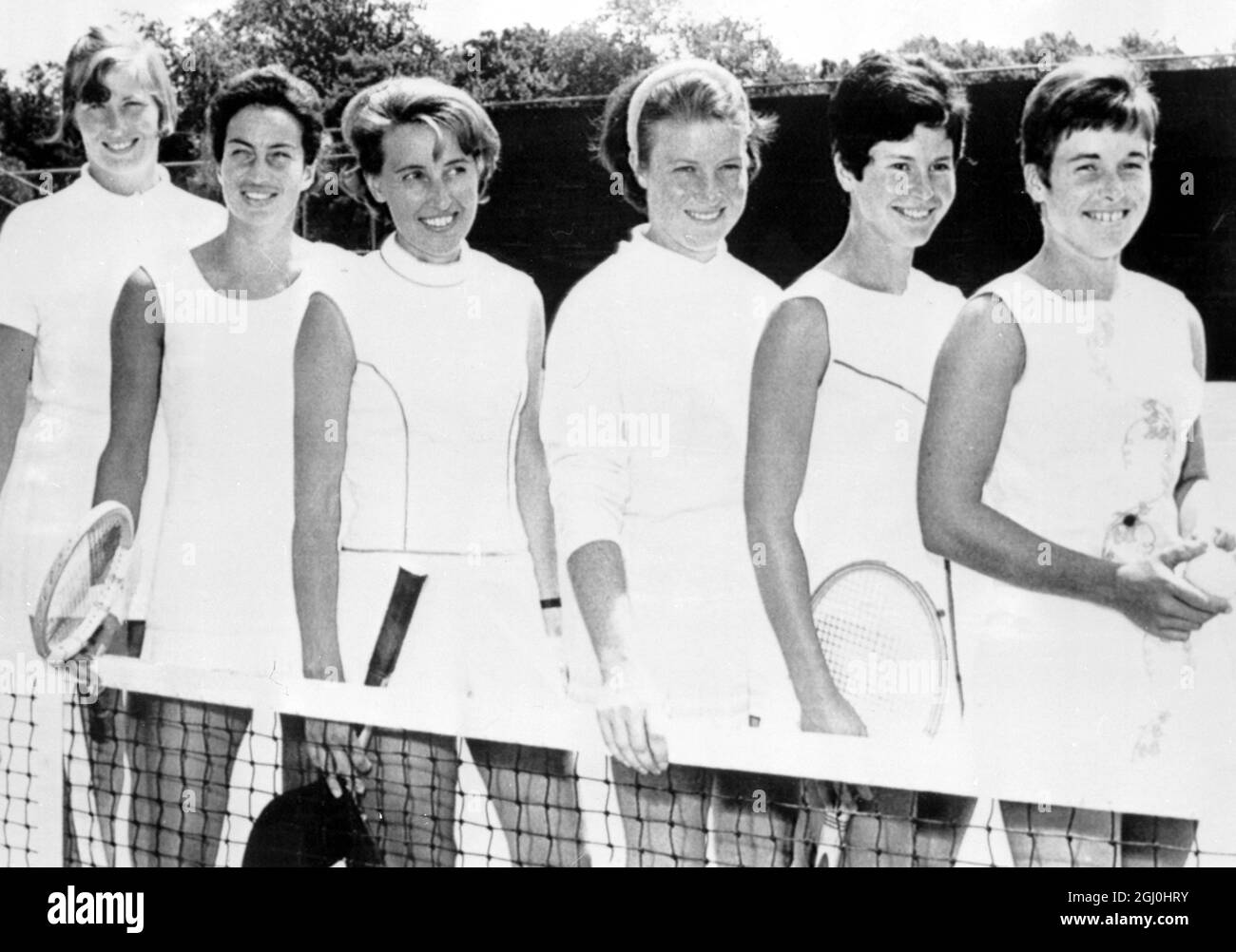 Cleveland heights, Ohio: Members of Great Britain's women's tennis team pose prior to a workout here August 6th in preparation for the Wightman Cup Matches to be played August 9th - 11th. They are, left to right: Christine Janes: Virginia Wade; Mrs Angela Barrett, non-playing captain; Nell Truman; Joyce Willams and Winnie Shaw. 7 August 1969 Stock Photo