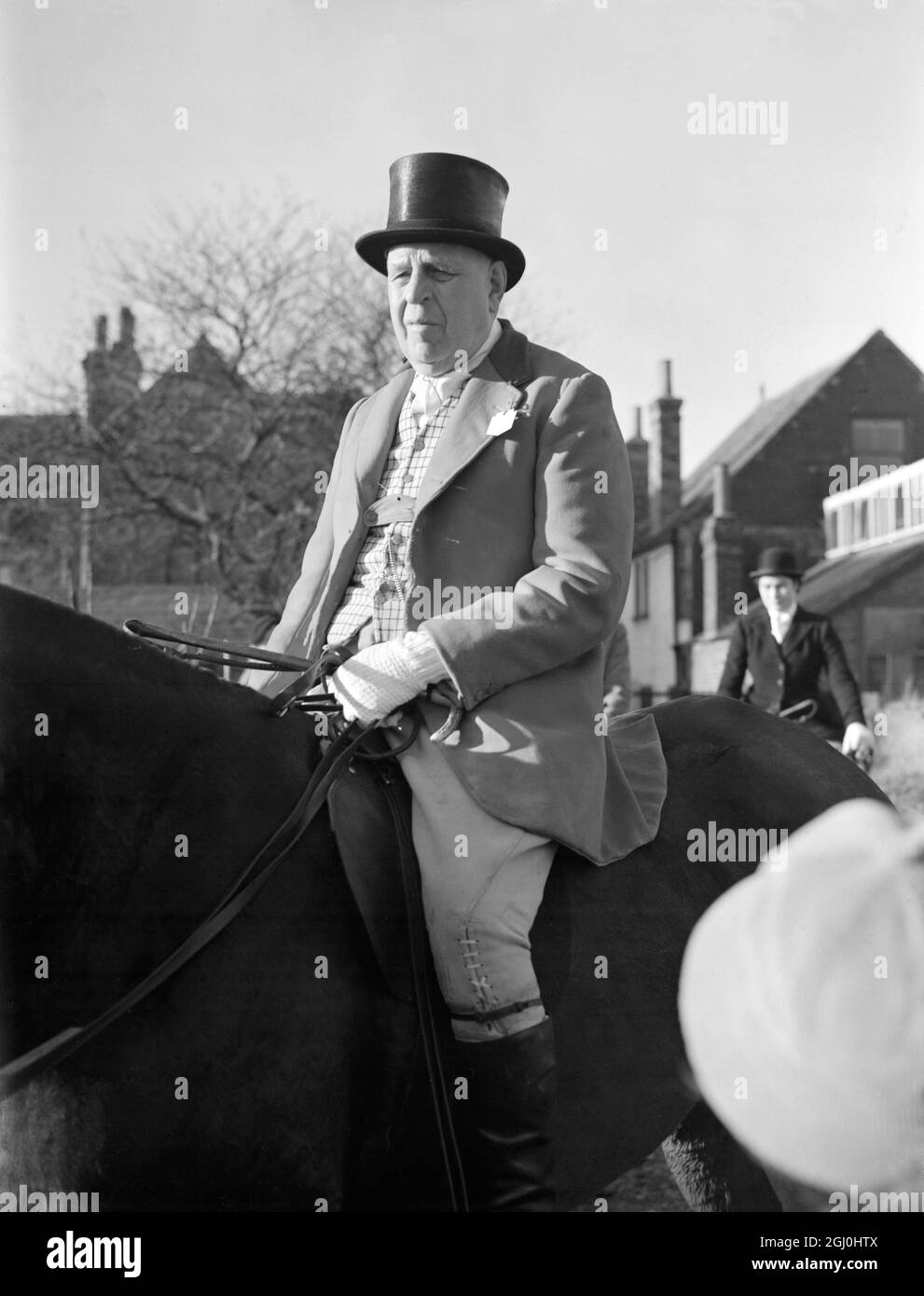 Well know figure of the Old Surrey and Burstow Hunt Sir Philip H. Manson-Bahr, M.D., D.S.O., F.R. C.P.. He was photographed when the hunt met at Edenbridge Kent. 30 November 1955 Stock Photo