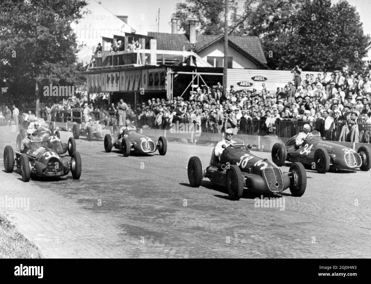 The start of the Grand Prix D'Europe at Barne, Switzerland recently, showing ,in front (No 38) Farina; on the left, Vimille, who is followed by Trossi, in an Alfa-Romeo, who was the winner. 6 July 1948 Stock Photo
