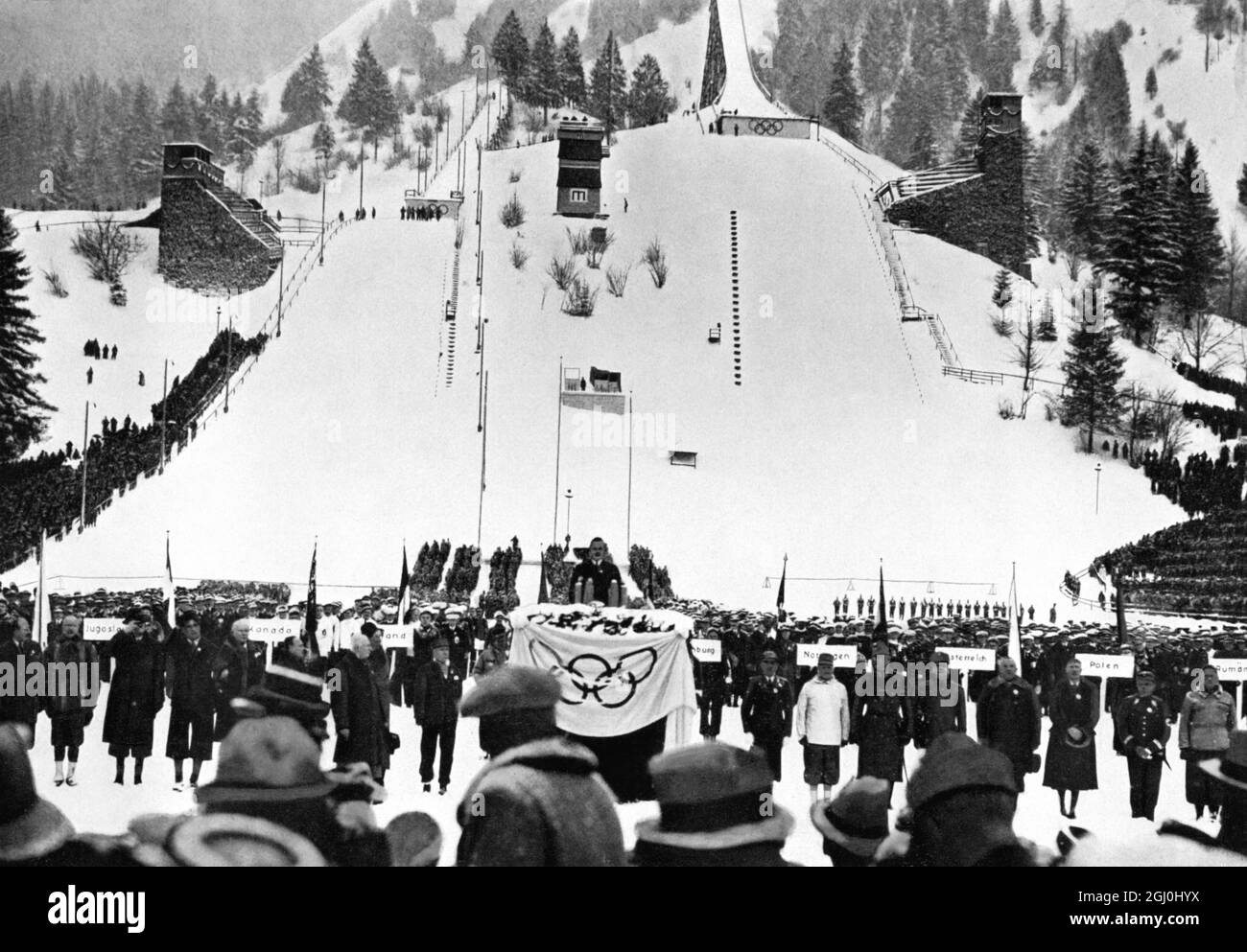 Dr. Karl Ritter von Halt, President of the Organisation for the IV Winter Olympics 1936 gives his inaugural address and welcome speech in the Olympic Ski Stadium to the teams of 28 nations. ©TopFoto Stock Photo