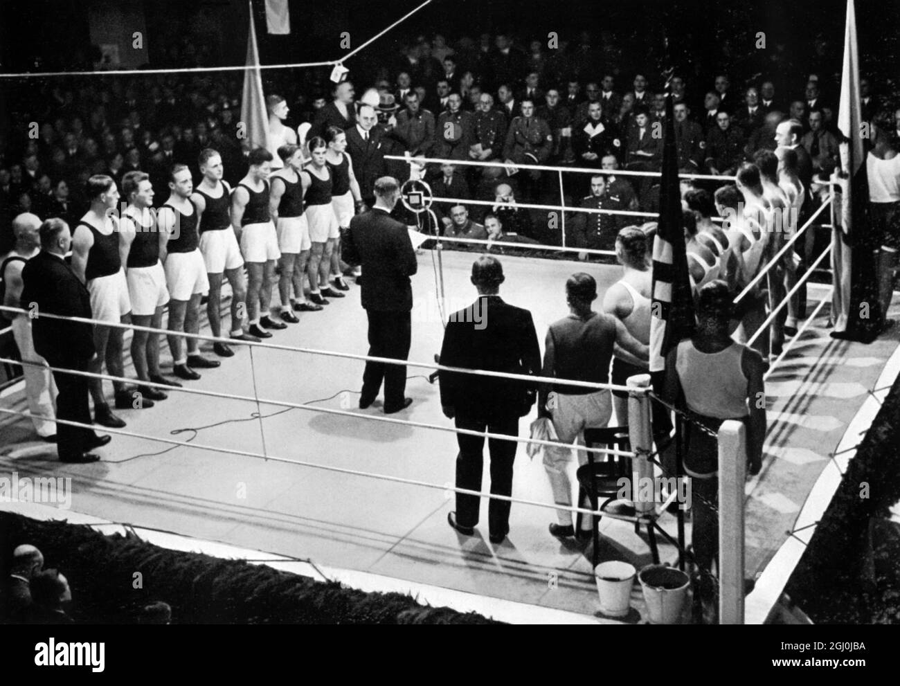 The German amateur boxers were successful in the pre-Olympic year. Here are seen the teams lined upto be presented ..... Germany - Poland - Germany triumphed 10:6. ©TopFoto *** Local Caption *** Stock Photo