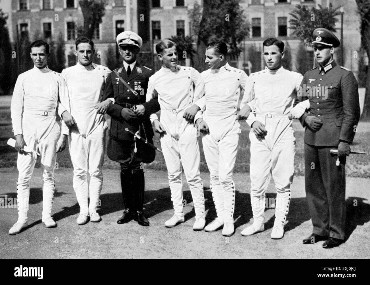 1936 Olympics - Fencing - The team of the victorious German five in Budapest (l-r) First Lieutenant Birk, First Lieutenant Handrick, Captain Heigl, Second Lieutenant Puttmann, Second Lieutenant Cramer, Second Lieutenant Lemp, Second Lieutenant Schreiber. ©TopFoto Stock Photo