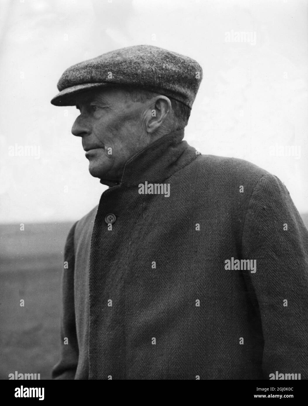 Fred Darling - horse trainer , record trainer of Derby winners whose stable have four fancied entrants thid year , watches with a keen eye during training . 7th June 1947 Stock Photo