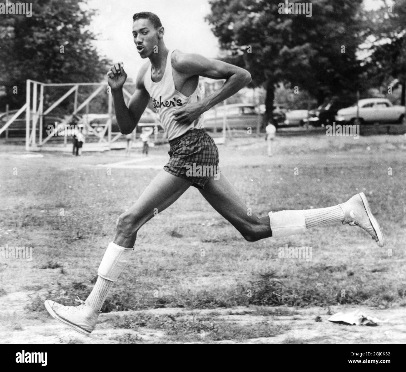 Wilt Chamberlain Pictured at age 17 when he was a senior at Philadelphia Overbrook High School when he was an athletic prospect. 9 August 1954 Stock Photo