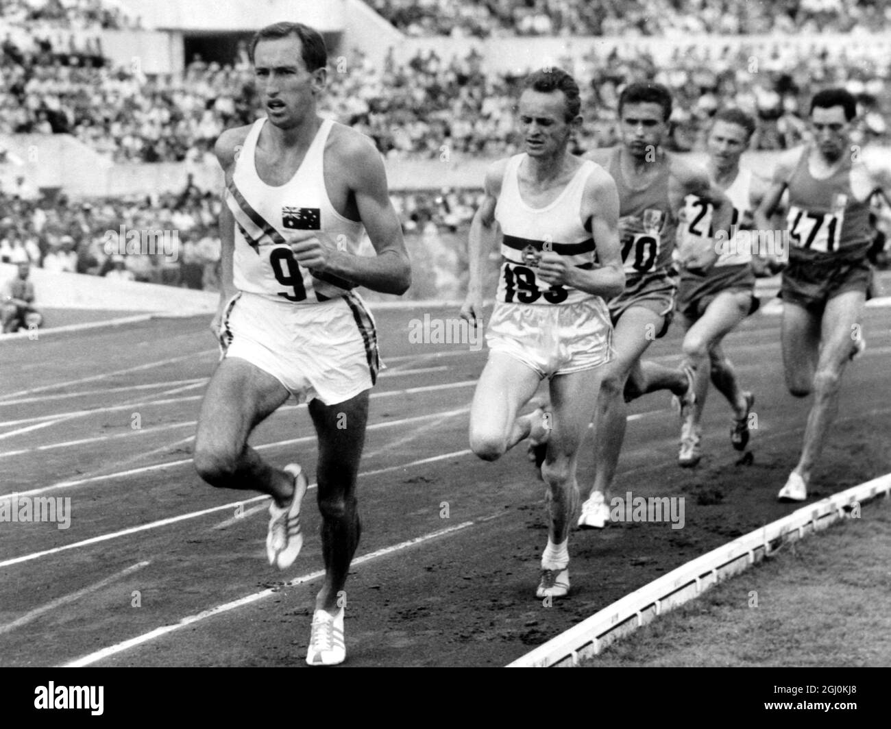 Heading for the gold medal Australia's Herb Elliott leading the field half way round during the final of the 1500 metres. He is followed by Istvan Roszavolgyi of Hungary , who was third and Michel Jazy of France who was second. Following them are Z. Varnos of Romania and M. Bernard of France 7th September 1960 Stock Photo
