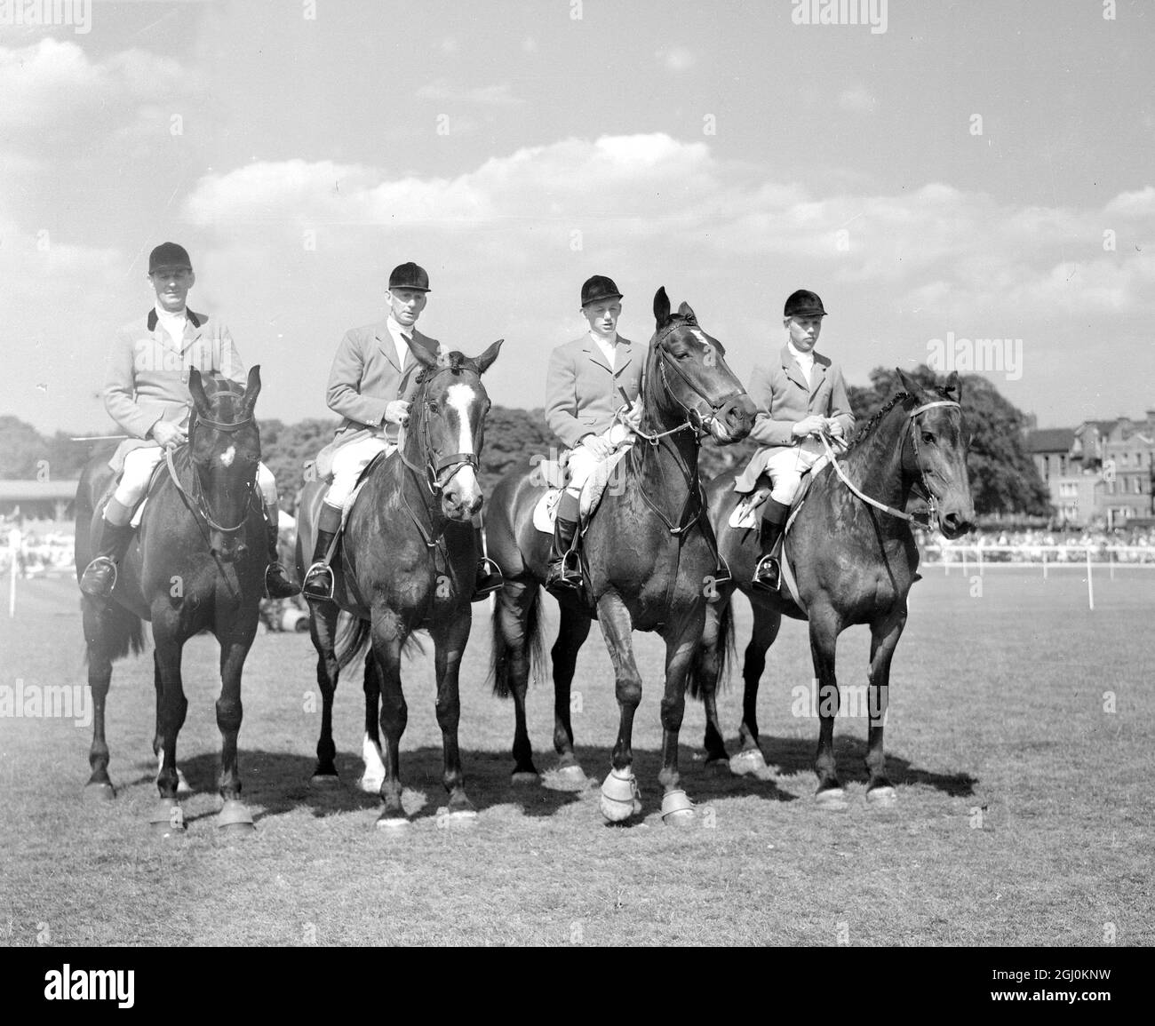 British Olympic Equestrian Team left to right Colonel Llewelyn on Monarch, W.H. White on Nizafella, A. Oliver on Atherlew and Peter Robinson on Craven A. Stock Photo